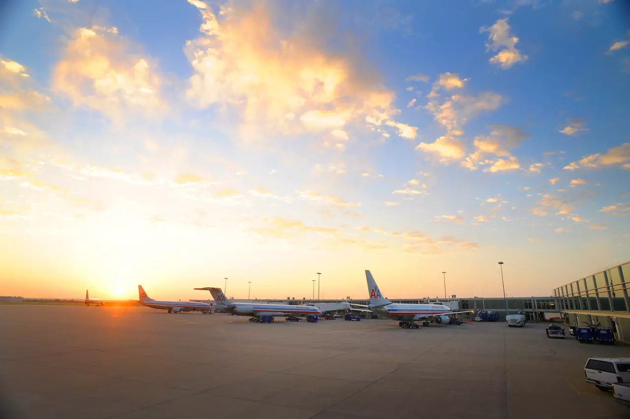 Airplanes parked at their gates.