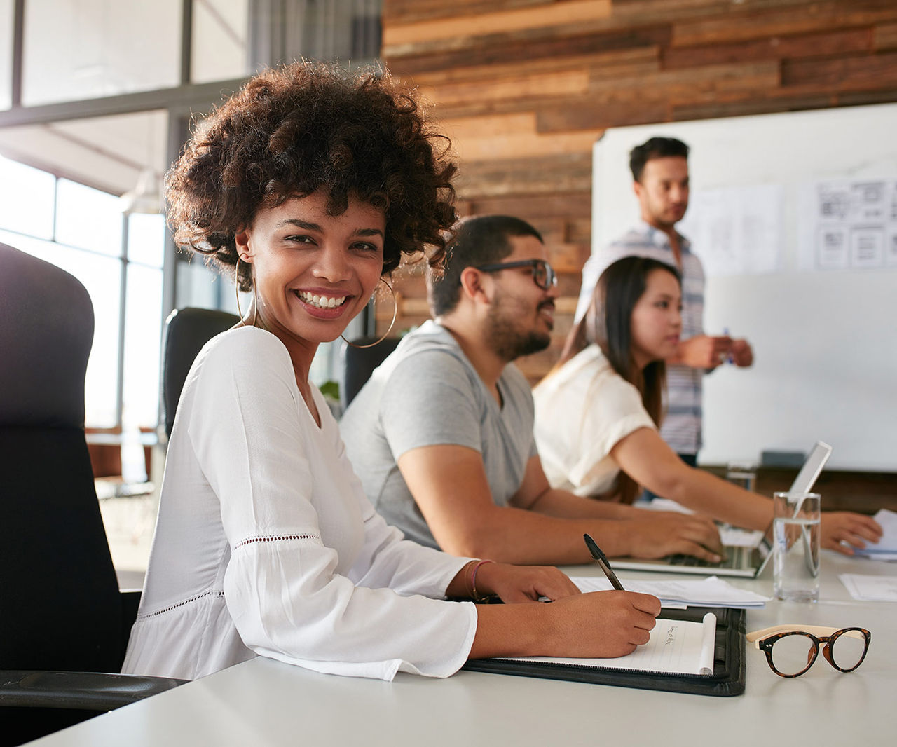 women sitting in meeting