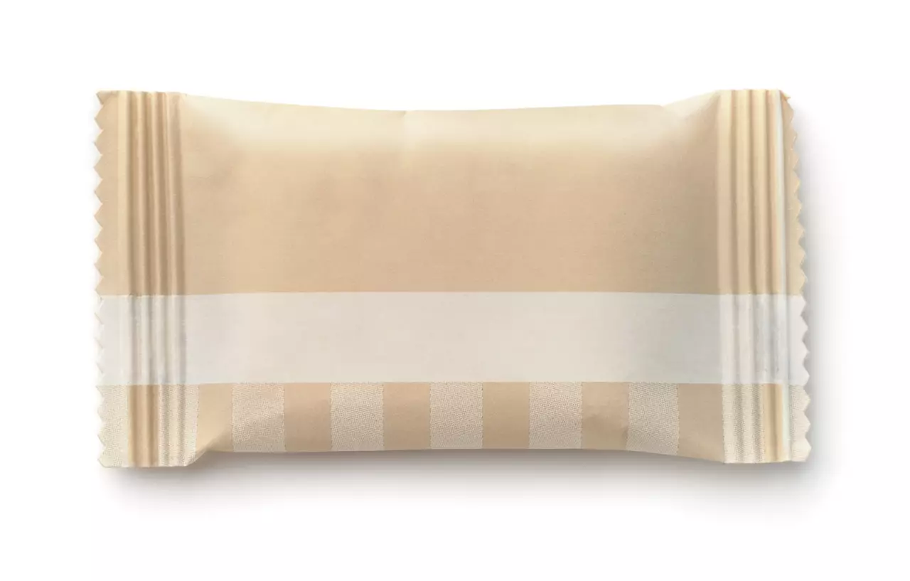 Top view of brown paper sachet isolated on white