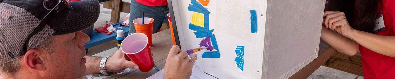 Dow volunteers painting